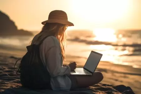 Digital-Nomad-Accommodation-Housing-for-Remote-Workers-young-woman-typing-laptop